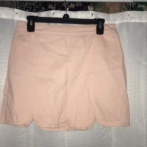 Scalloped pink mini skirt